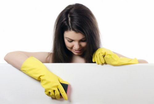 Technician pre-treating stains during steam carpet cleaning in Crooklog